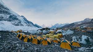 Everest Base Camp with tents and snow-capped mountains