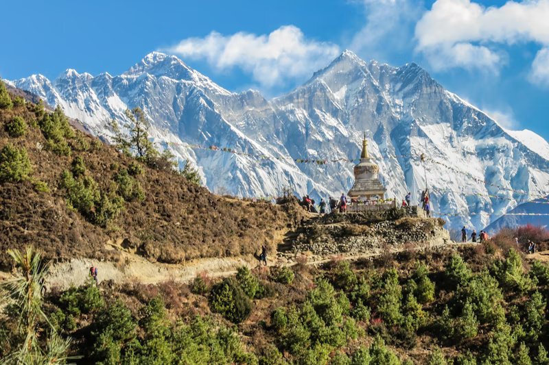 Annapurna Base Camp with mountains and clear blue sky